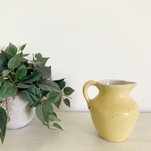small vintage yellow pitcher
